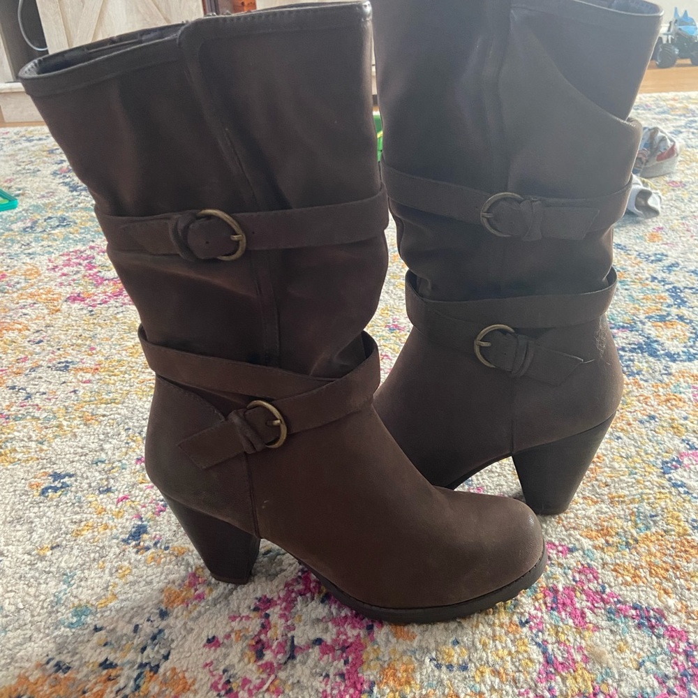 Brown boots with buckle detail
